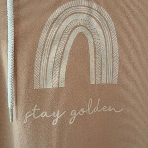 Bella Canvas Peach hoodie with White 'Stay Golden' Rainbow Graphic